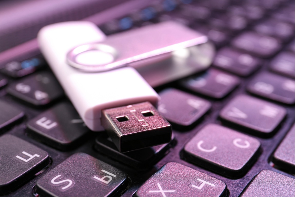 Digital life management workspace showing organized laptop and secure files
